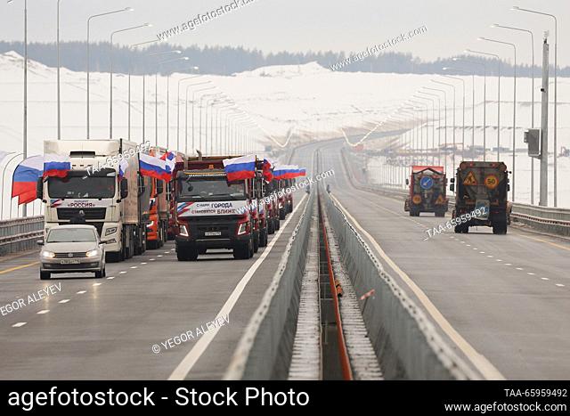 RUSSIA, REPUBLIC OF TATARSTAN - DECEMBER 21, 2023: A convoy of trucks moves along M12 Highway as it opens to traffic. The distance of 810km from Moscow to Kazan...