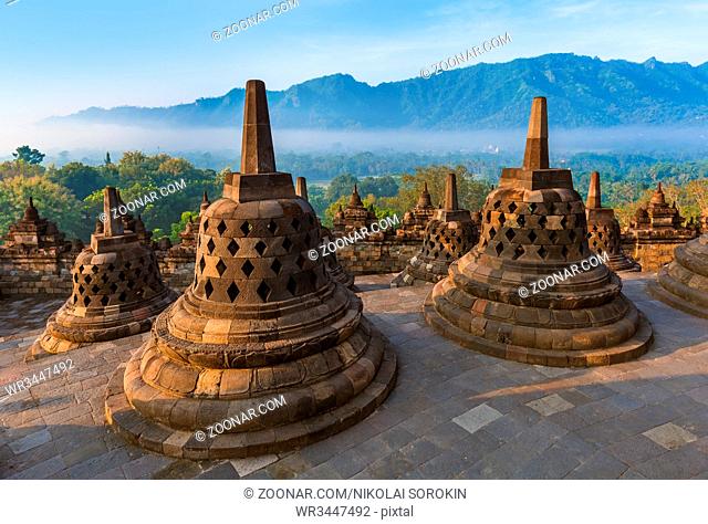 Borobudur Buddist Temple in island Java Indonesia - travel and architecture background