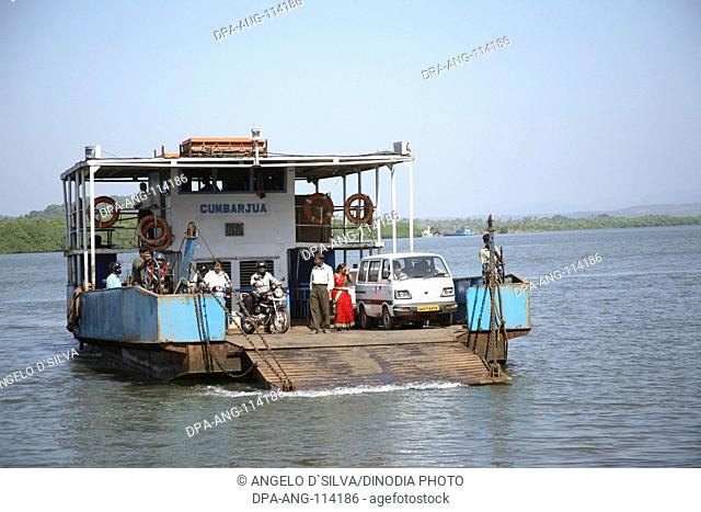 Ferry Boat coming from Chorao Island to Ribander , Dr. Salim Ali Bird Sanctuary in background , Goa, India , NO PROPERTY RELEASE AVAILABLE