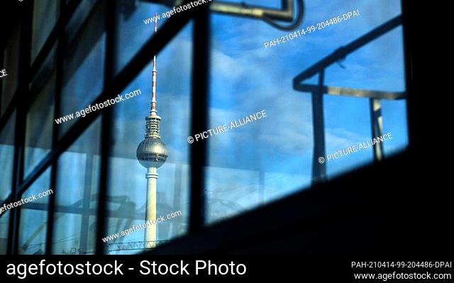 09 April 2021, Berlin: The television tower can be seen through window panes in the Jannowitzbrücke underground station in Berlin-Mitte