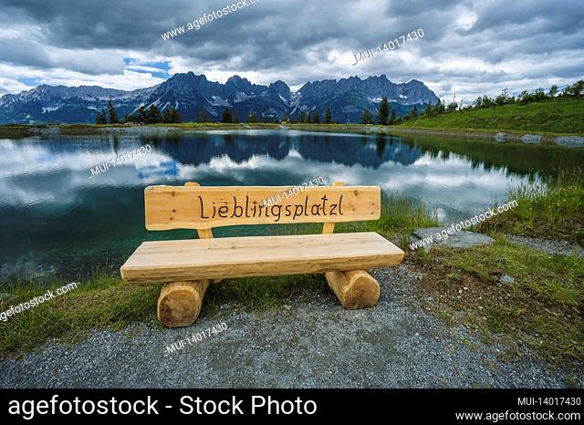 astberg lake benach with darling little place phrase. wilderkaiser mountains in background. ellmau, austria