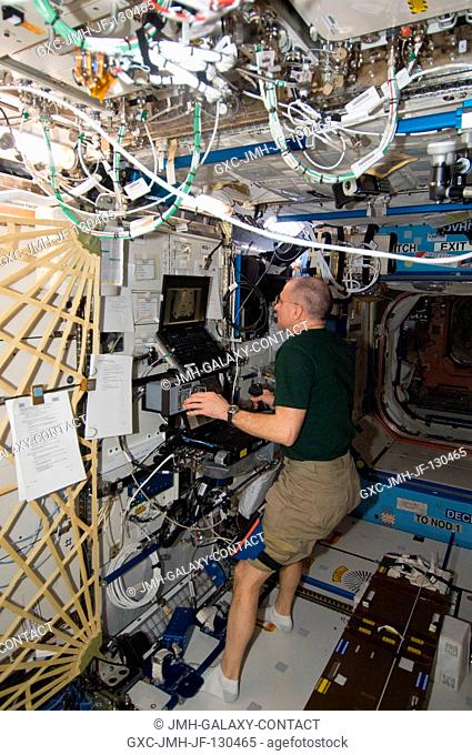 In the International Space Station's Destiny laboratory, NASA astronaut Don Pettit, Expedition 30 flight engineer, conducts the first of three sessions on the...