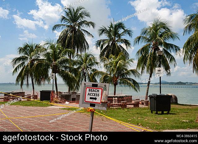 Singapore, Republic of Singapore, Asia - Blocked off area with barbecue pits at Changi Beach Park during the lasting corona crisis