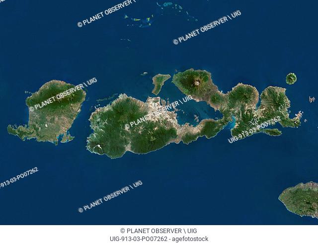 Satellite view of West Nusa Tenggara Province, Indonesia (with country boundaries and mask). The image shows the two largest islands in the province which are...
