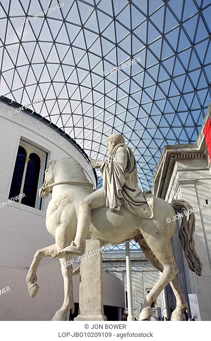 A Roman equestrian statue in the Queen Elizabeth II Great Court, the central quadrangle of the British Museum. The entire court is covered by a glass...
