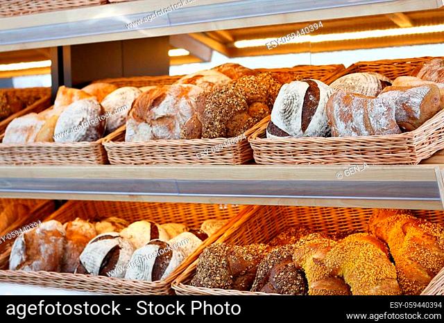 Baked bread in a bakery shop display. Selective focus