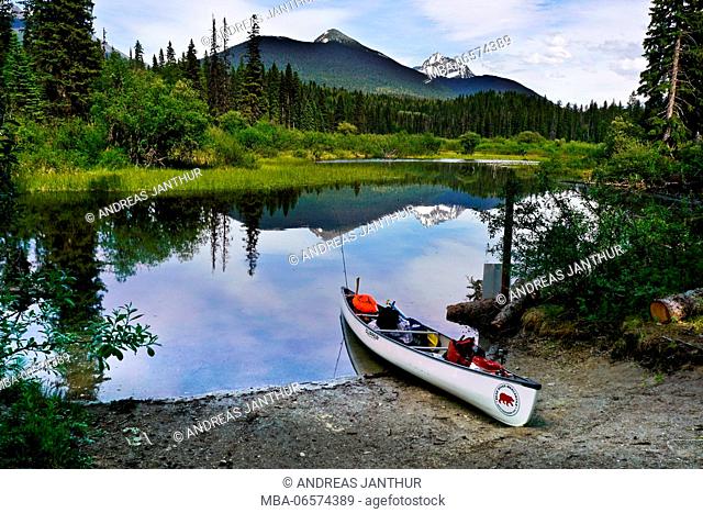 A packed canoe on the shore, canoe trip in the Bowron Lake Provincial Park, Cariboo Mountains, Canada
