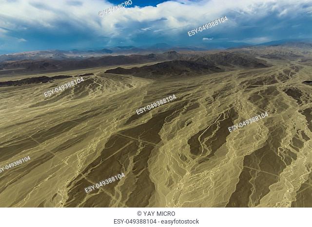 Aerial view of the Nazca Desert with highways cutting across