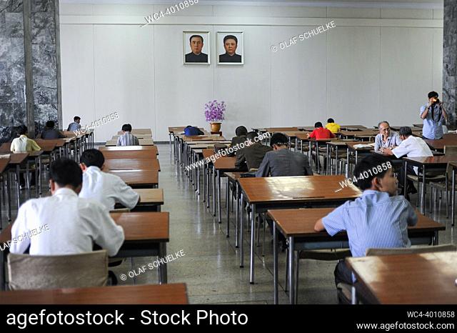 Pyongyang, North Korea, Asia - Students sit inside the reading room at the Grand People's Study House, the central library located in the North Korean capital...