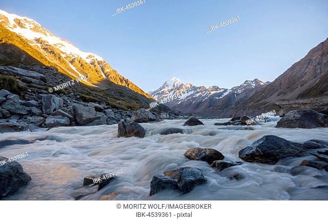 Sunrise, Hooker River, Mount Cook illuminated by morning sun, Mount Cook National Park, Southern Alps, Hooker Valley, Canterbury, South Island, New Zealand