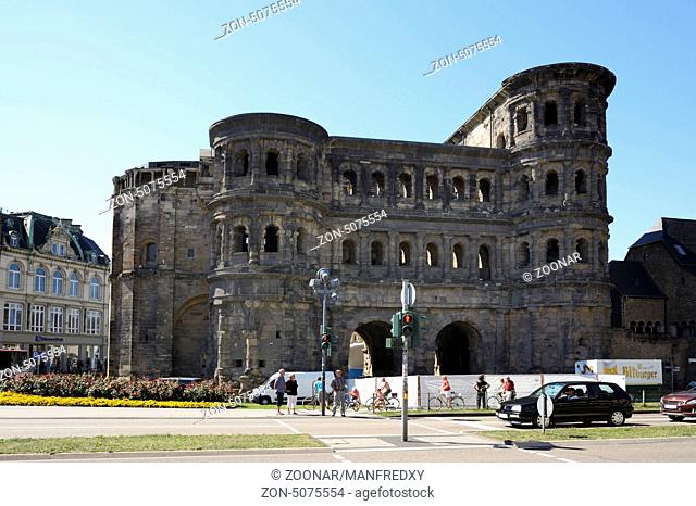 TRIER, GERMNAY - SEPTEMBER 4: The Porta Nigra in Trier, Germany on September 4, 2013. The Porta Nigra was built by the romans in grey sandstone between 186 and...