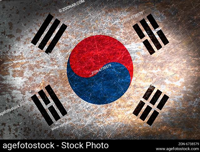 Old rusty metal sign with a flag - South Korea