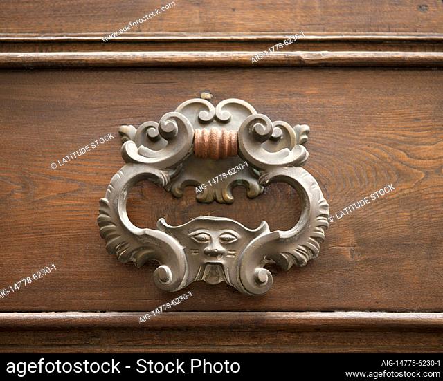 The historic town of Lucca in Northern Tuscany is home to some fine examples of historic architecture including ornate door furniture