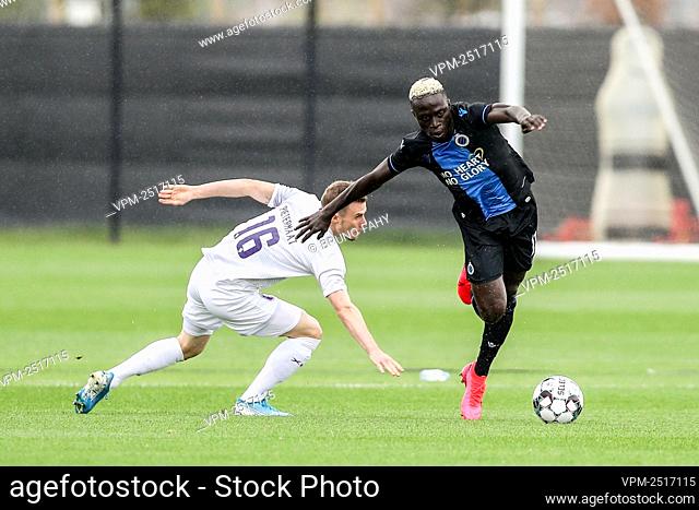 Beerschot's Tom Pietermaat and Club's Krepin Diatta fight for the ball during a friendly game between first league team Club Brugge and 1B team Beerschot