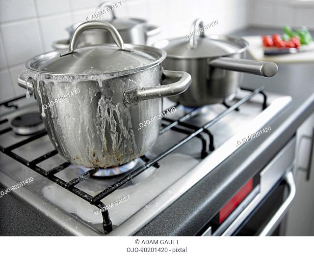 Pot boiling over in kitchen