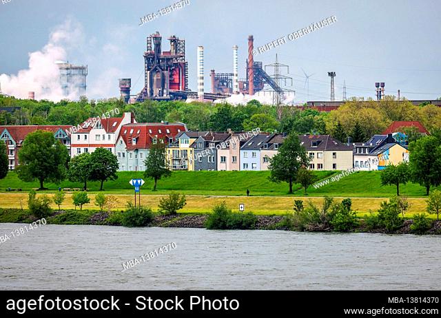 Duisburg, North Rhine-Westphalia, Germany - Urban landscape in the Ruhr area with the Rhine in front of residential buildings in the Laar district and behind...