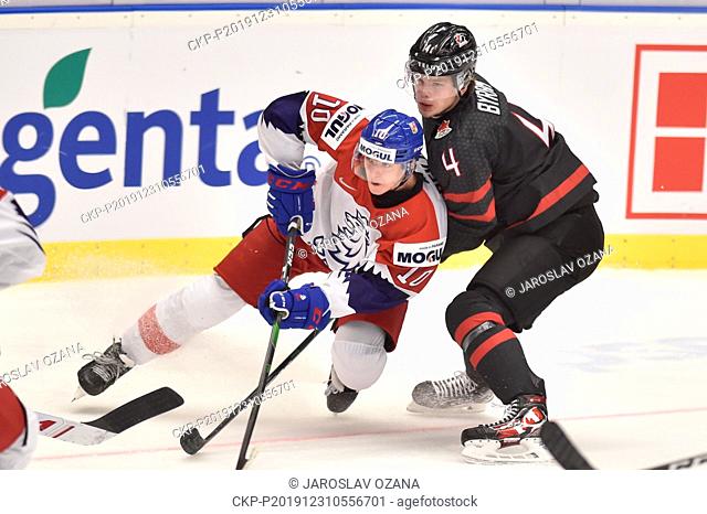 L-R Matej Pekar (CZE) and Bowen Byram (CAN) in action during the 2020 IIHF World Junior Ice Hockey Championships Group B match between Canada and Czech Republic...