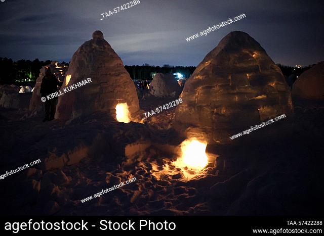 RUSSIA, NOVOSIBIRSK - FEBRUARY 18, 2023: A view shows igloos, dome-shaped Inuit houses of hard snow blocks, built during a competition as part of the Igloo 2023...