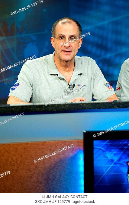 NASA astronaut Don Pettit, Expedition 3031 flight engineer, responds to a question from a reporter during an Expedition 3031 preflight press conference at...