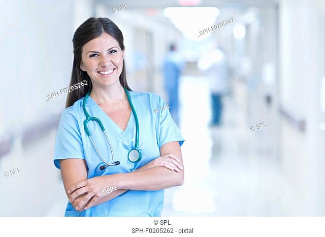 Female doctor smiling towards camera