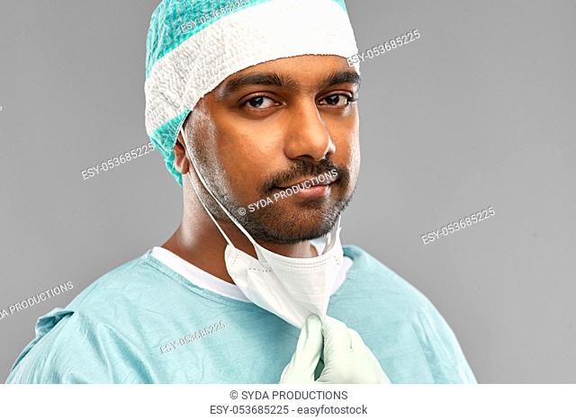 face of doctor or surgeon with protective mask