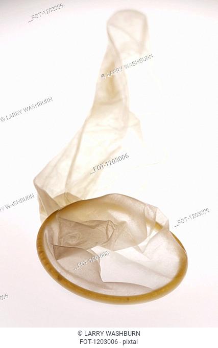 An empty used condom