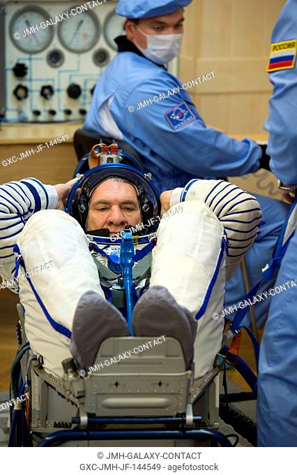 In the Integration Facility at the Baikonur Cosmodrome in Kazakhstan, Expedition 52-53 crewmember Paolo Nespoli of the European Space Agency undergoes a leak...