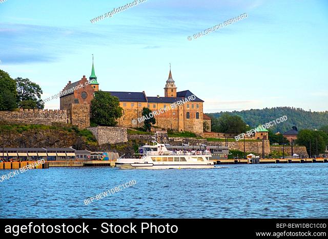 Oslo, Ostlandet / Norway - 2019/08/31: Panoramic view of medieval Akershus Fortress - Akershus Festning - historic royal residence at Oslofjorden sea shore
