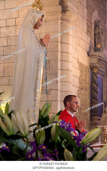 MASS CELEBRATED IN THE CHURCH OF RUGLES (27), FRANCE