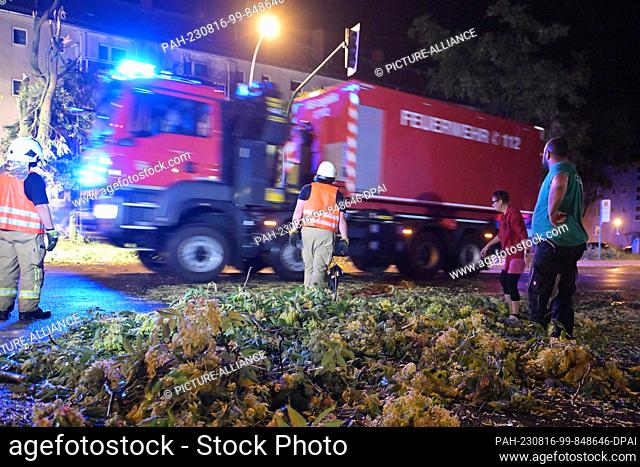 15 August 2023, Brandenburg, Brandenburg an der Havel: A fire truck drives along the road. A thunderstorm caused a lot of damage