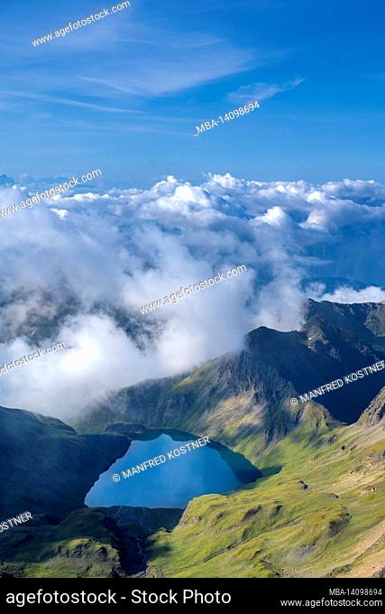vals, mühlbach, bolzano province, south tyrol, italy. view down from the summit of the wilder kreuzspitze to the wilder see