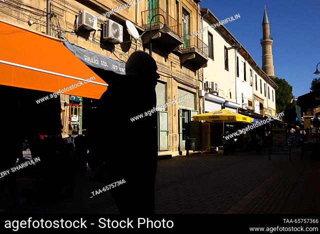 CYPRUS, NICOSIA - DECEMBER 14, 2023: A man crosses one of the city's streets. The Turkish Republic of Northern Cyprus is a de facto state declared independent...