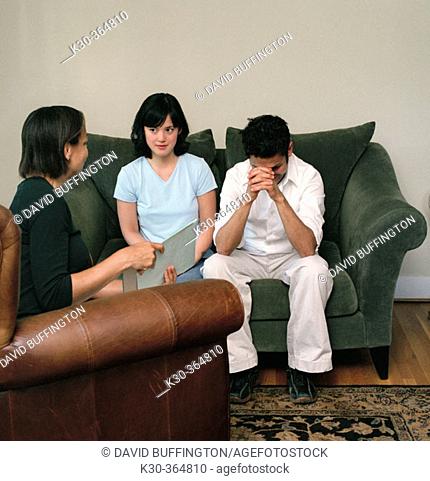 Man and woman in marriage counseling session