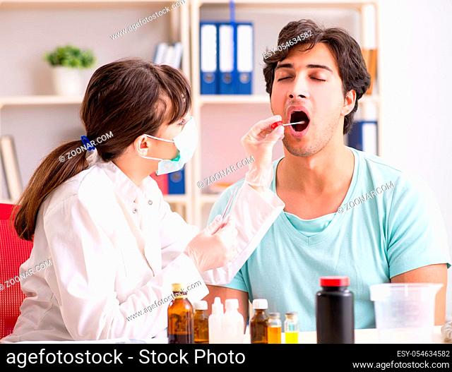 Young handsome man visiting female doctor dentist for removal of tartar
