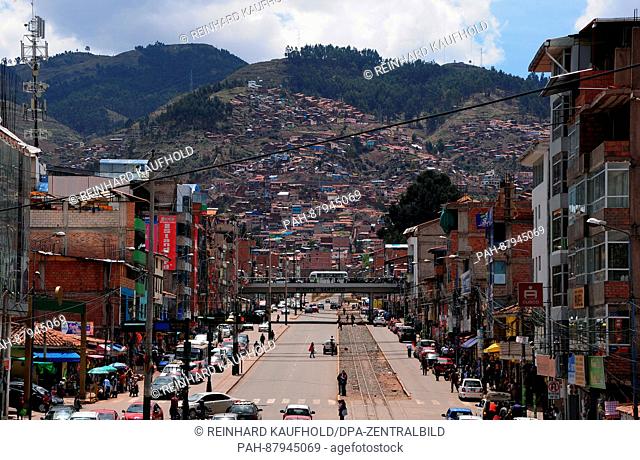 Out and about in the old capital of the powerful Inca empire and the later colonial town of Cuzco. Street scene in a relatively new residential and commercial...