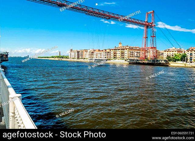 View from Portugalete, Spain: the famous Vizcaya Bridge built in 1893, declared a World Heritage Site by UNESCO and the town of Getxo in the background