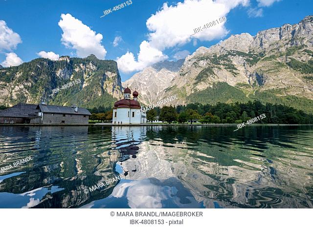Water reflection, Lake Königssee with Watzmann Massif and pilgrimage church of St. Bartholomew, National Park Berchtesgaden, Berchtesgadener, Upper Bavaria