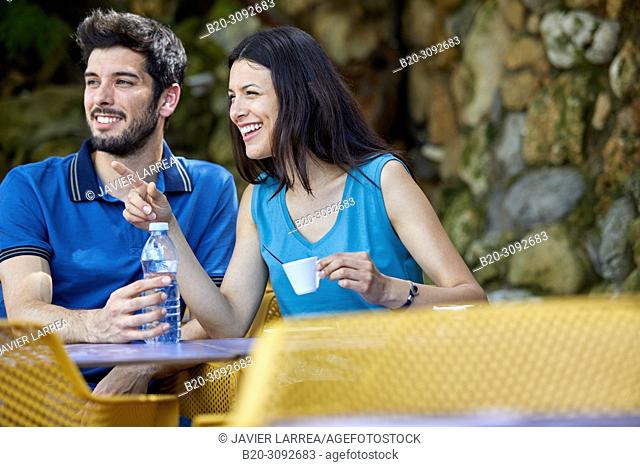 Couple on a terrace taking coffee, Plage du Port Vieux, Biarritz, Pyrenees Atlantiques, France, Europe