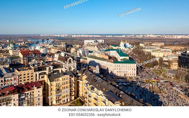 View from the height of the city of Kiev and its districts. Modern buildings in the city center, St. Andrew's Church, Podolsky Bridge and the left coast of the...