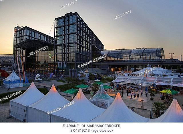 Berlin Hauptbahnhof, central railway station, with event tents in the foreground on an early summer evening, Mitte, Berlin, Germany, Europe