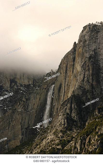 Yosemite Falls falls over the side of a granite monolith