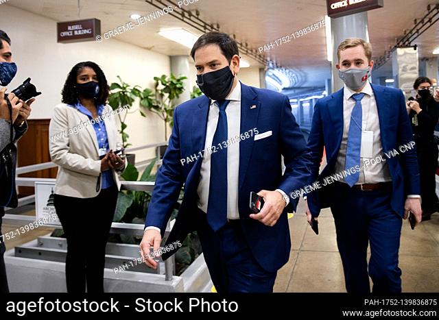 Senator Marco Rubio, R-FL, walks on Capitol Hill in Washington, Saturday, Feb. 13, 2021, before the fifth day of the second impeachment trial of former...