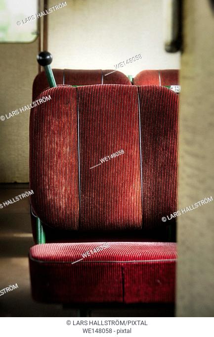 Empty seats in old retro railway carriage. Vintage transportation