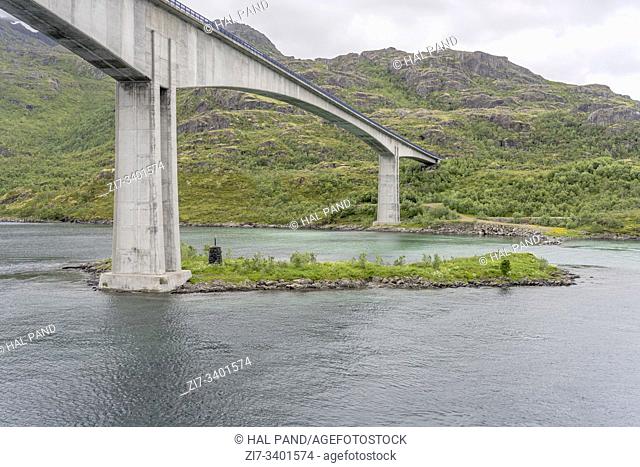 high bridge over Tengelfjord, shot from underneath under bright cloudy light near Brottoya, Austvagoya, Lofoten, Norway