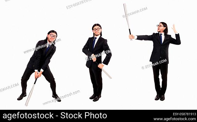 Young elegant man in black suit holding bat isolated on white