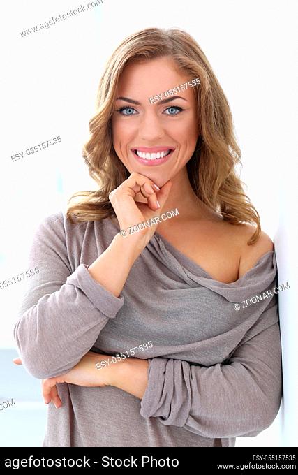Attractive, beautiful woman with wide smile
