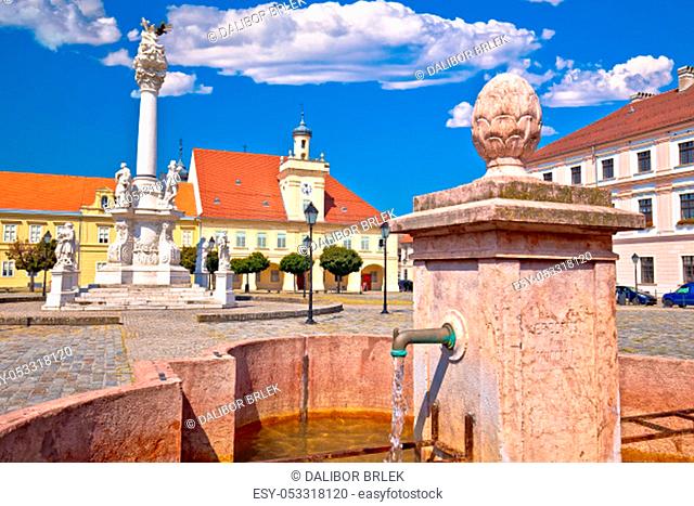Old paved street and fountain in Tvrdja historic town of Osijek, Slavonija region of Croatia