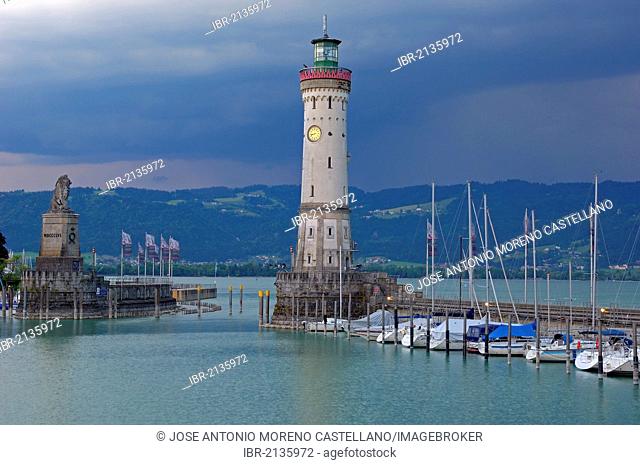 Lighthouse and Bavarian Lion at the harbor entrance, Lindau, Bodensee, Lake constance, Bavaria, Germany, Europe