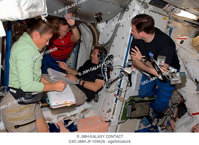 Astronauts Heidemarie Stefanyshyn-Piper, STS-126 mission specialist; Chris Ferguson (left background), commander; Steve Bowen and Greg Chamitoff