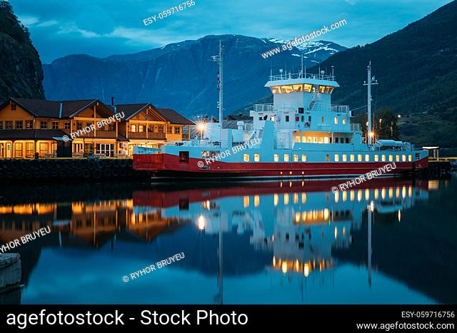 Flam, Norway. Touristic Ship Boat Moored Near Berth In Sognefjord Port. Summer Night. Norwegian Longest And Deepest Fjord